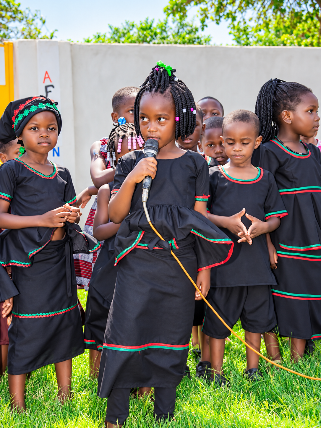 Learner speaking during a cultural presentation